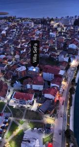an overhead view of a city at night at Villa SeFa in Struga