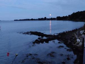 a view of a large body of water at night at 4 star holiday home in Svendborg in Svendborg