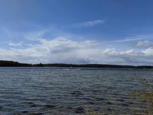 a large body of water with a boat in it at 4 star holiday home in Svendborg in Svendborg +66 photos