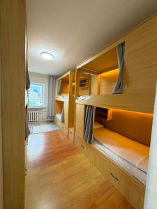 a room with many bunk beds in it at GG Hostel MONGOLIA 지지호스텔 몽골 in Ulaanbaatar