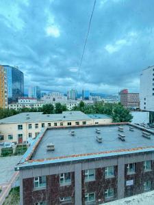 a view of a building in a city at GG Hostel MONGOLIA 지지호스텔 몽골 in Ulaanbaatar