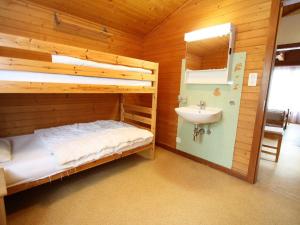 Letto o letti in una camera di Chalet in Crans Montana near Ski Slopes