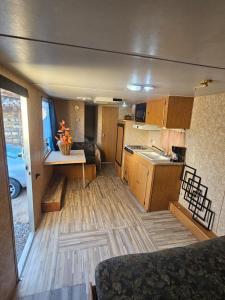 a kitchen and living room of an rv at Casa Rodante Tony 2 in San Felipe +2 photos