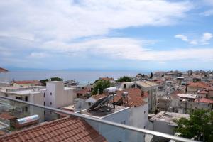 a view of a city from the roof of a building at Diamond Suite in Nea Kallikrateia