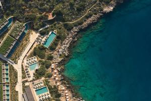 an aerial view of the beach and the ocean at JW Marriott Crete Resort & Spa in Marathi
