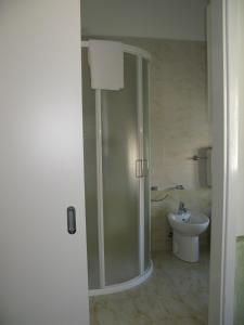 Koupelna v ubytování Hotel Astoria