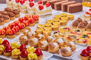 a display of different types of cakes and pastries at Fuji Lake Hotel in Fujikawaguchiko +56 photos
