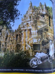 a book with a picture of a building with a cart at Gîte des collines in Saint-Donat-sur-lʼHerbasse +4 photos