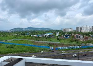 a view of a parking lot in a city at Hotel Somani Wakad in Méribel Village