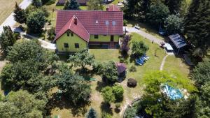 an overhead view of a house with a red roof at Mihály Kulcsos Vendeghaz in Őriszentpéter