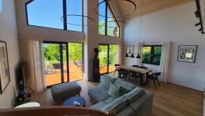 a living room with a couch and a table at Chata Vista in Rožnov pod Radhoštěm