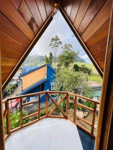 a view from the balcony of a house at The Cloud-Line Cabana in Nuwara Eliya