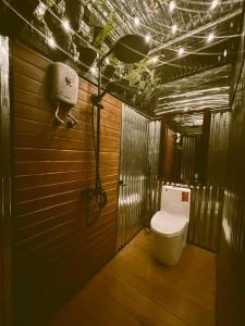 a bathroom with a toilet and a shower at FREESCAPE Quiet Reset - Lakeside Mountainview in Cavinti +87 photos