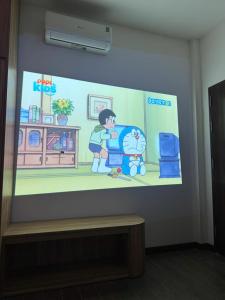 a mural on a wall in a room at Emlyhome Hanriver in Danang