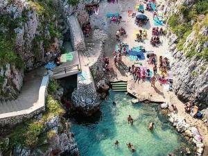a group of people at a water park at B&B Cèsar in Castrignano del Capo