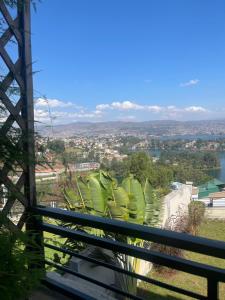 a view of a city from a balcony at Mona Rusizi in Cyangugu