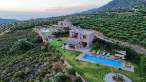 an aerial view of a house with a swimming pool at VILLA DEMETRA in Kissamos