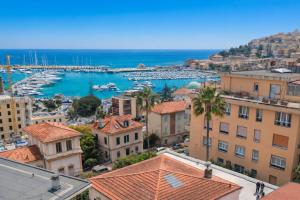 a view of a harbor with boats in the water at Villa Thomas in Imperia