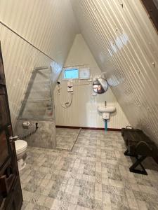 a bathroom with a sink and a toilet at 385 Homestay & Lake camp in Ban Khai Nao (1) +82 photos