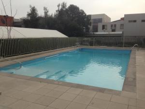 Bazén v ubytování Vista Apartments - Aire Acondicionado y Estacionamiento nebo v jeho okolí