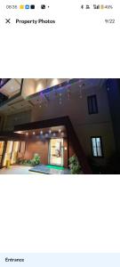 a picture of a hallway in a building at HOTEL The Breeze in Pachamba