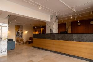 a lobby with a reception desk in a building at Settle inn Jebal apartments in Cairo +38 photos