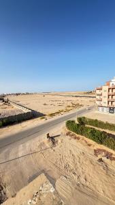 an empty road in the middle of a desert at Sunrise View K8 Apartments in Hurghada