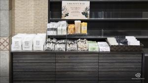 a store shelf withiazepines and other products on it at Daiwa Roynet Hotel Kobe Sannomiya in Kobe