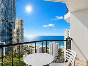 a balcony with a table and a view of the ocean at L19 Ocean View Suite - King Bed Wi-Fi in Gold Coast +25 photos