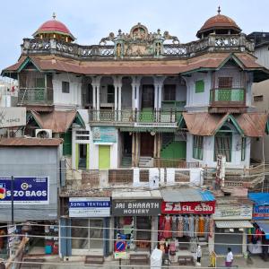 a large building with akritkritkritkritkritkritkritkritkritkritkrit at Umbrella Guest House - Palace Suite in Madurai