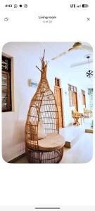 a bird cage sitting in a living room at The courtyard Zanzibar in Ngambo