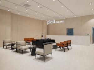 a room with chairs and a couch and a table at Plott The Gak Yangyang in Yangyang +200 photos