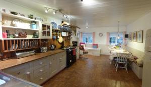 Kuchyň nebo kuchyňský kout v ubytování Ty Isaf