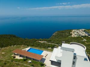 an image of a villa with a view of the ocean at Villa Harizma in Budva