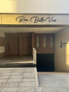 a building with a sign that reads for ball wine at Modern Studio in Kenitra +5 photos