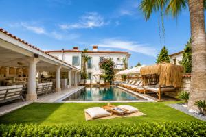 an image of a villa with a swimming pool at Alaçatı Limonaia Hotel in Alaçatı