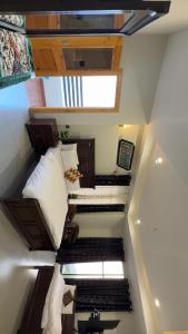 a small room with a bed and stairs in it at Malam jabba Hotel reservation in Swat +4 photos