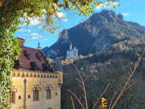 a castle with a mountain in the background at Alpen Liebe Prem in Prem
