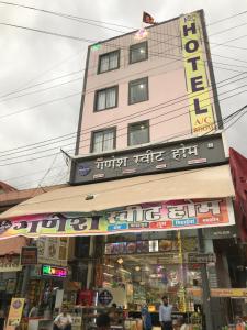 a building with a sign on the front of a store at Hotel keshri Nandan in Nāgaur