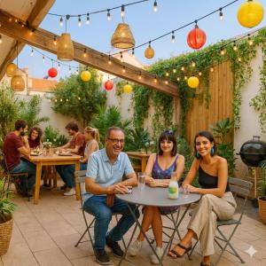 a group of people sitting at a table in a restaurant at Hostel-Élisée-Perpignan in Perpignan