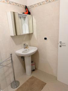 a bathroom with a sink and a mirror at Alle Torri in Terni +92 photos