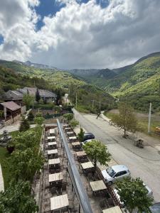arial view of a street with cars parked on the road at HotelRestaurant Gështenja in Suharekë +13 photos