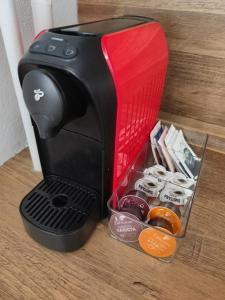 a coffee maker sitting on top of a table at Studio11 in Medzilaborce