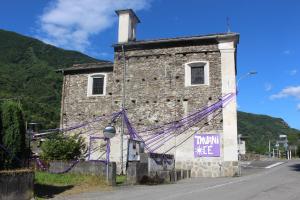 an old stone building with a sign on it at TAVANIs HOUSE in Delebio