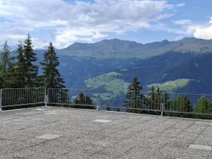 a balcony with a view of the mountains at Casa Cris SoleAlto in Marilleva