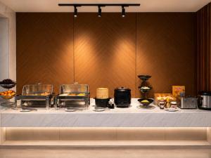 a table with food on top of it at JubingeHotel 聚滨阁华人酒店 in Cairo
