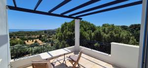 a view from the balcony of a villa at Villa Avra - Apartment Hydra in Asgourou