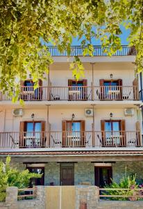 an exterior view of a building with balconies at Aetherion in Agios Ioannis Pelio