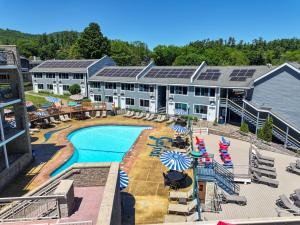 an aerial view of a resort with a swimming pool at Surfside On The Lake in Lake George