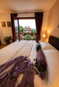 a bedroom with a bed with a view of a patio at Apartmány Sonáta Luhačovice in Luhačovice +89 photos